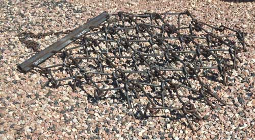 used - 4 foot by 4 foot pull type chain/pasture harrows